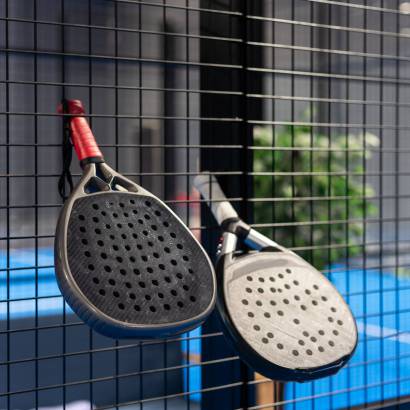 Paddle objects on blue court. High quality photo